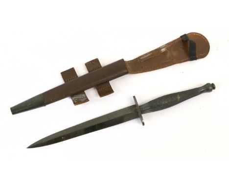 A Second Pattern Fighting Knife, with blackened finish, 17cm hand forged steel blade, the steel crossguard stamped with a bro