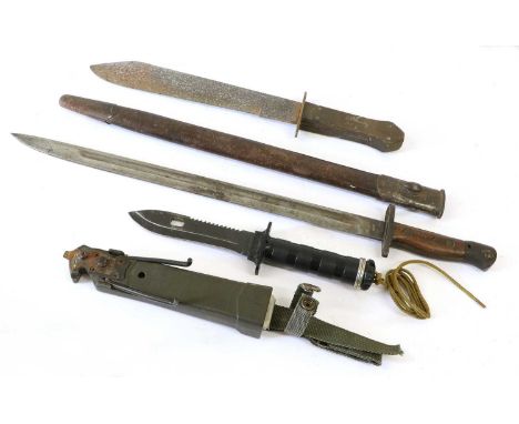 A Victorian Bowie Knife, the 26.5cm clip point steel blade stamped with a skull and crossbones logo, with rosewood coffin han