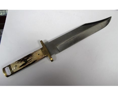 Late XX Century Bowie Knife, 10¼" blade by J. Nowill, Sheffield, heavy staghorn grips, the blade engraved with makers name et