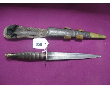 Mid XX Century Fiarburn and Sykes Fighting Knife, made by William Rodgers, Sheffield, contained in its brown leather scabbard