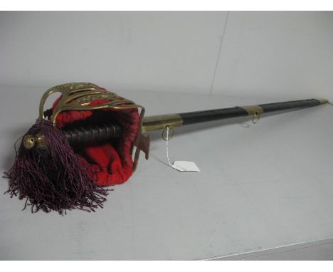 Replica Basket Hilted Scottish Broad Sword, in its black leather scabbard with brass fittings.