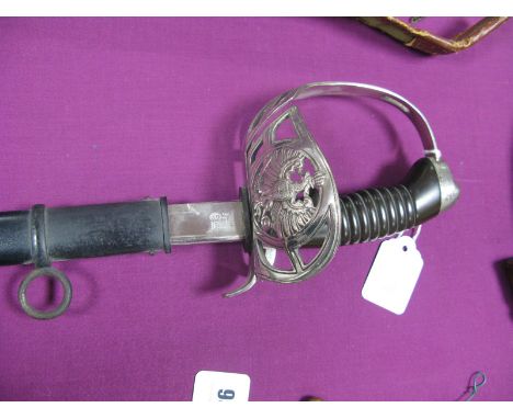 A Late XIX Century Officers Sword by W.K.&C. (German) with Plated Piped Back Blade, white metal guard/hilt with Imperial Eagl