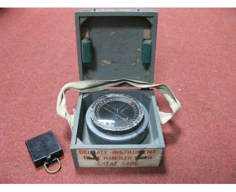 A WWII and Later Marching Compass Mark 1, a Type P11 Compass, War Department marked, in wooden carrying box.