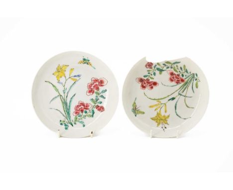 A pair of famille rose dishes, Yongzheng mark and period, each painted with butterfly, peony and lily, 15cm diameter (one bro