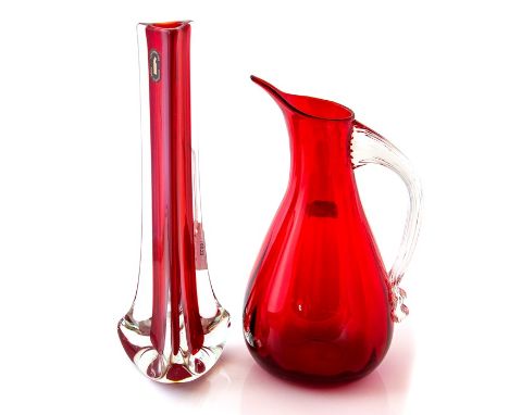 A mid century Whitefriars ruby coloured glass vase (23cms high approx) along with a ruby coloured glass jug (21cm high approx