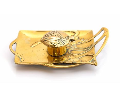 A German brass early 20th Century inkwell in Art Nouveau style with magnolia detail, with Geschutzt back stamp.