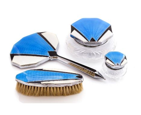 A 1930s Art Deco style plated 4 piece dressing table set, including 2 covered glass bowls, brush and hand mirror, with blue, 