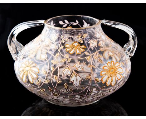 A pair of late 19th Century twin handled squat vases with applied enamel daisies, 9cms high approx and 15 cms wide approx.Con