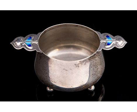 A Birmingham 1905 silver two handled bowl with Art Nouveau style enamel decoration on both handles, 1.46oz. (9cms wide approx