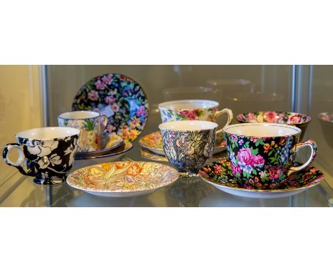 A collection of Mid Century Chintz Ware tea cups and saucers, including Royal Winton examples, various patterns including Que