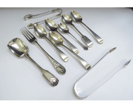 Two silver sugar nips, various silver teaspoons, caddy spoon and small fork, 190g 