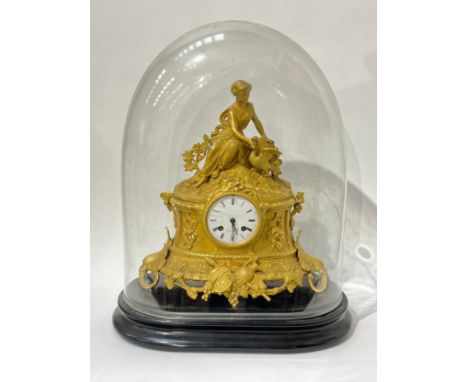 A 19th Century French Stevenard of Boulogne ormolu and gilt mantel clock, the case surmounted by a female figure, the enamel 