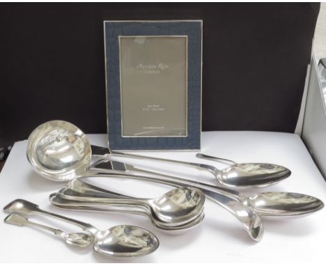 Various plated flatware including large serving ladle, serving spoons, soup spoons, and an Addison Ross photograph frame 