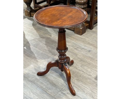 A Victorian mahogany tripod table, circular top over turned column, 62cm tall, 38.5cm diameter 