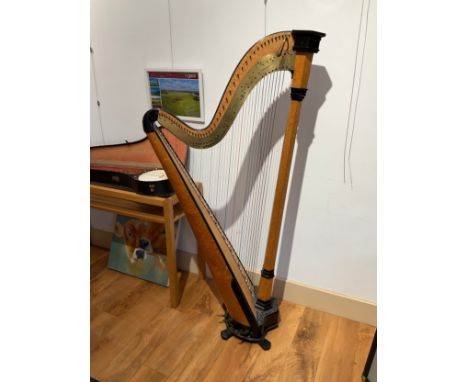 A Regency harp by I &amp; I Erat of 23 Berners Street, London. Birdseye maple and ebonised frame, brass mounts, Gothic style 