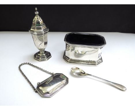 A silver salt with blue glass liner, salt spoon, Gin decanter label and pepperette, various makers and dates, 129g 