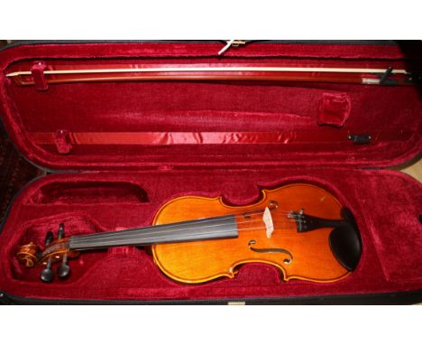 A Forenza violin and bow, in original case