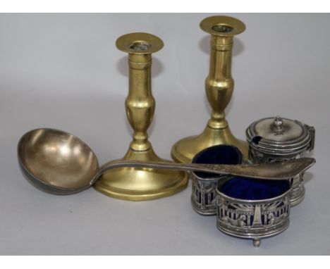 A pair of early 19th century brass candlesticks, a WMF cruet stand and a ladle