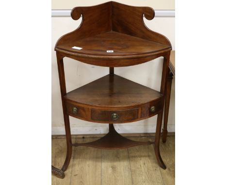 A George III mahogany bow fronted two tier washstand, W.61cm