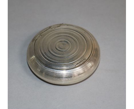 A George III silver circular snuff box by Wardell & Kempson, Birmingham, 1807, 57mm.