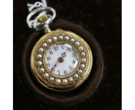 An early 20th century silver, yellow metal and enamel fob watch with split pearl set bezel, the back decorated with the bust 