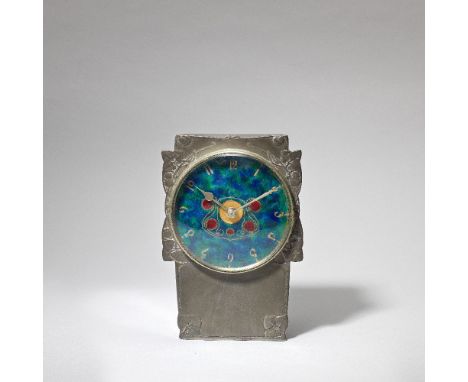 Archibald Knox'Tudric' mantel clock, model no. 0609, 1902-1905Pewter, enamel, gilt. The central celtic-inspired motif of red 