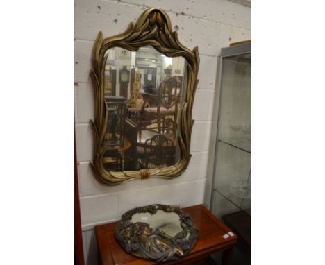 Two decorative Art Nouveau style mirrors.