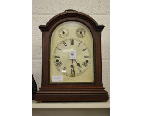 A mahogany cased mantle clock.