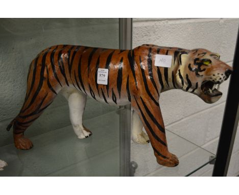 A papier mache model of a tiger.