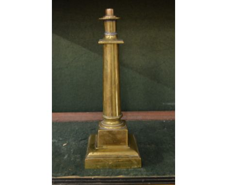 A brass lamp base.