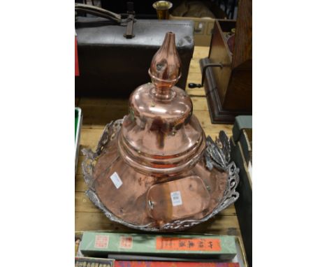 The copper top section of a Victorian street lantern.