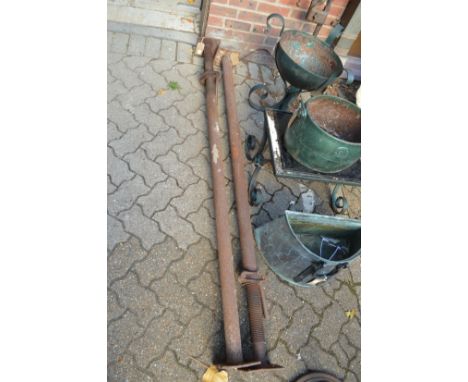 A pair of Acrow props.