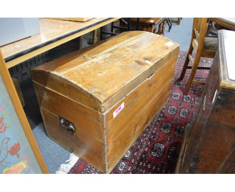 A pine dome top trunk.