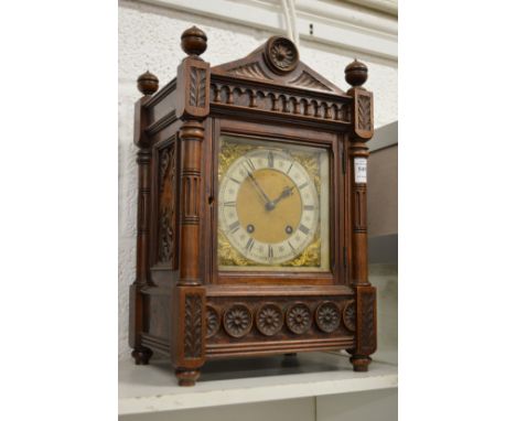 A walnut cased mantle clock.