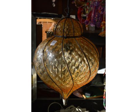 A brown opaque glass ceiling light.