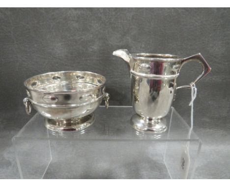 A MATCHED HALLMARKED SILVER JUG AND BOWL BY WILLIAM HUTTON &amp; SONS LTD, the bowl being Birmingham 1911, the jug being Ches