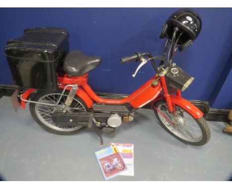 A 1985 HONDA CAMINO MOPED REGISTRATION C43 KNT, with V5C documents, a Haynes repair manual and open faced helmet and topbox (