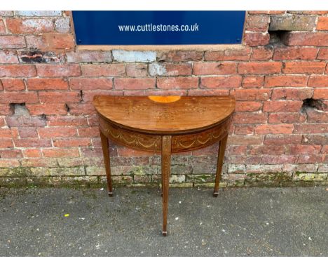 A 19TH CENTURY MAHOGANY INLAID DEMI-LUNE CARD TABLE, having satinwood inlaid details throughout, the fold over top opening to