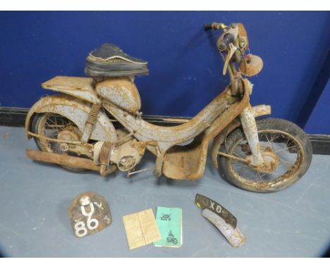 A 1957 BSA 70cc DANDY FOR RESTORATION, with original registration book and maintenance manual, no V5C document