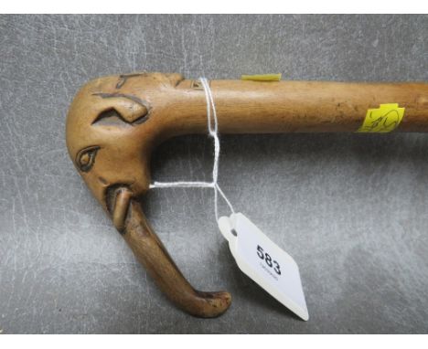 A 19TH CENTURY WALKING STICK, with bearded man and elephant handle inscribed KEPKVP, L 90 cm