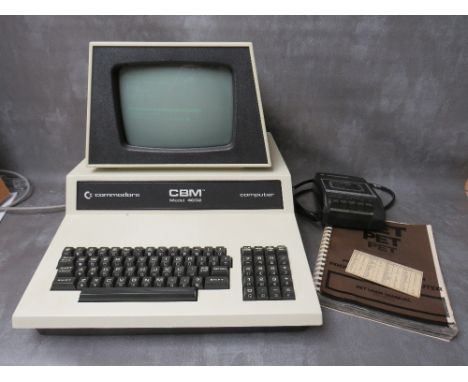 A VINTAGE COMMODORE MODEL 4032 COMPUTER, complete with datassette and original user manual, Provenance: From a house clearanc