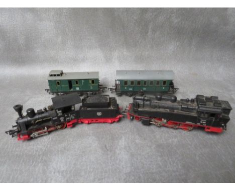 TWO UNBOXED FLEISCHMANN 00 SCALE STEAM LOCOMOTIVES, one with tender, together with two pieces of Fleischmann  rolling stock