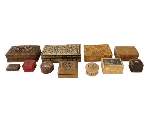 A collection of ten assorted carved wooden collector's and trinket boxes including cinnabar lacquered ecample, mother of pear