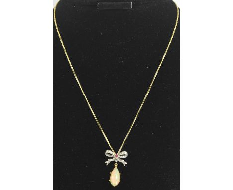 A 925 hallmarked silver gilt fine link necklace, suspending a 925 hallmarked silver gilt diamond, ruby and opal set pendant, 