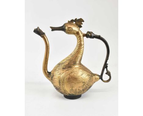 A 19th century Indian gilt bronze teapot modelled as a duck, height 30cm, width 28cm.