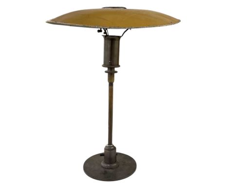 POUL HENNINGSEN FOR LOUIS POULSEN; a mid century table lamp, with bronzed base and yellow painted circular shade, height 54cm