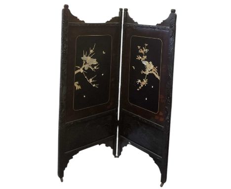 A modern Chinese carved hardwood two-section room dividing screen, set with white painted wood and mother of pearl decoration
