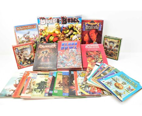 A collection of vintage fantasy role-playing games including Dungeons and Dragons Set 1 Basic Rules, Warhammer Fantasy Battle