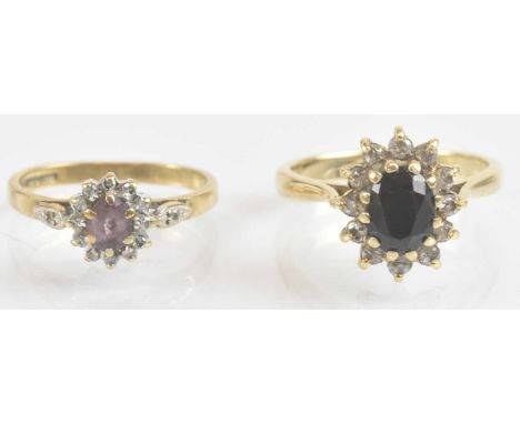 Two 9ct gold dress rings comprising a small claw set amethyst with diamond chip border, size K, approx 2.2g, and a claw set s
