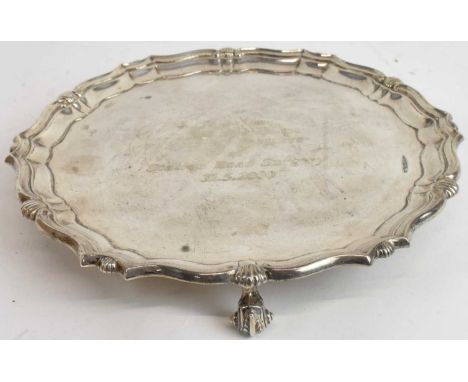 GARRARD &amp; CO LTD; a George V hallmarked silver salver, inscribed 'To Brian on his Retirement from his Partners at Station